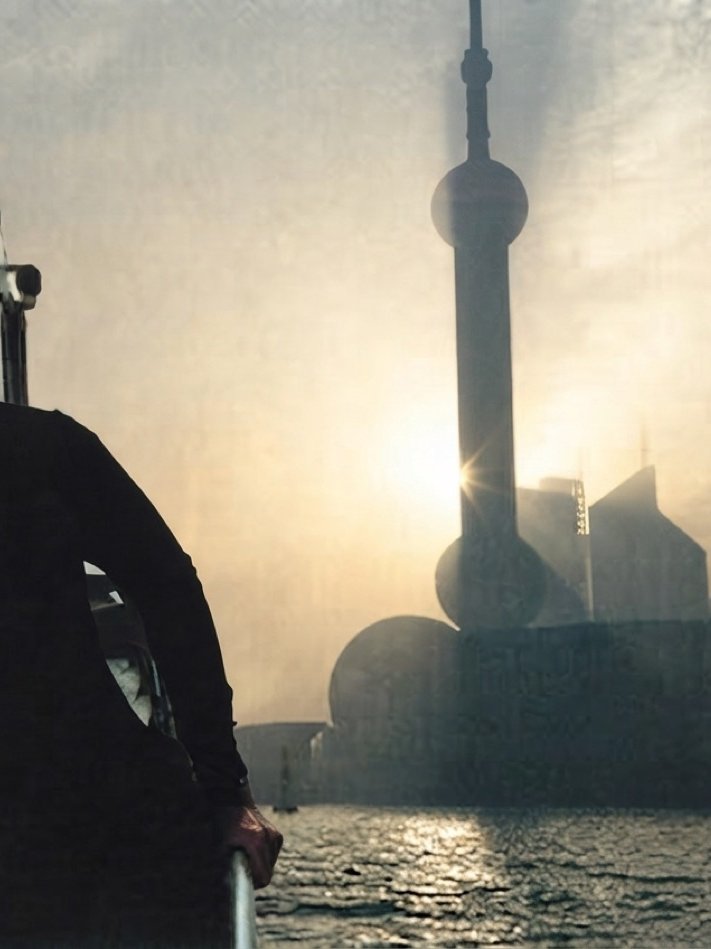 The Oriental Pearl Tower backlit at dawn on the Bund