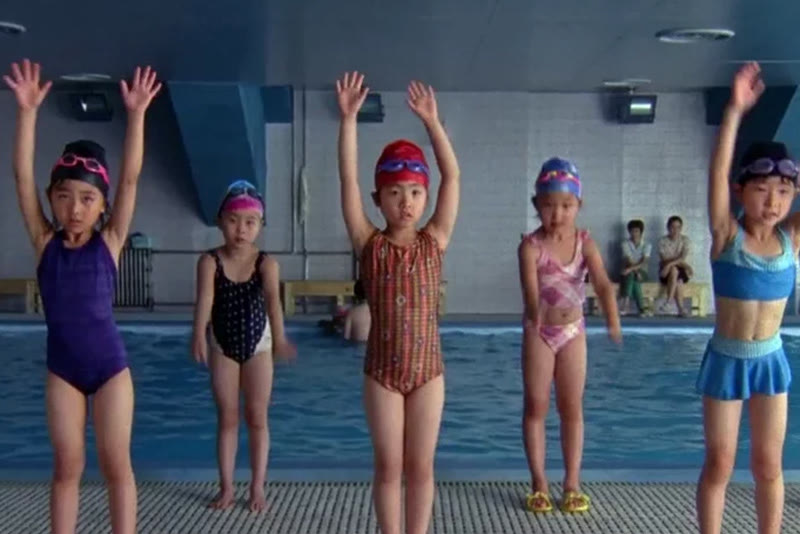 Young swimmers poolside from P&G Moms