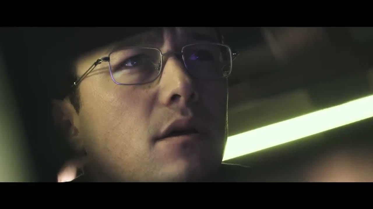Joseph Gordon-Levitt as Edward Snowden in a dark close-up